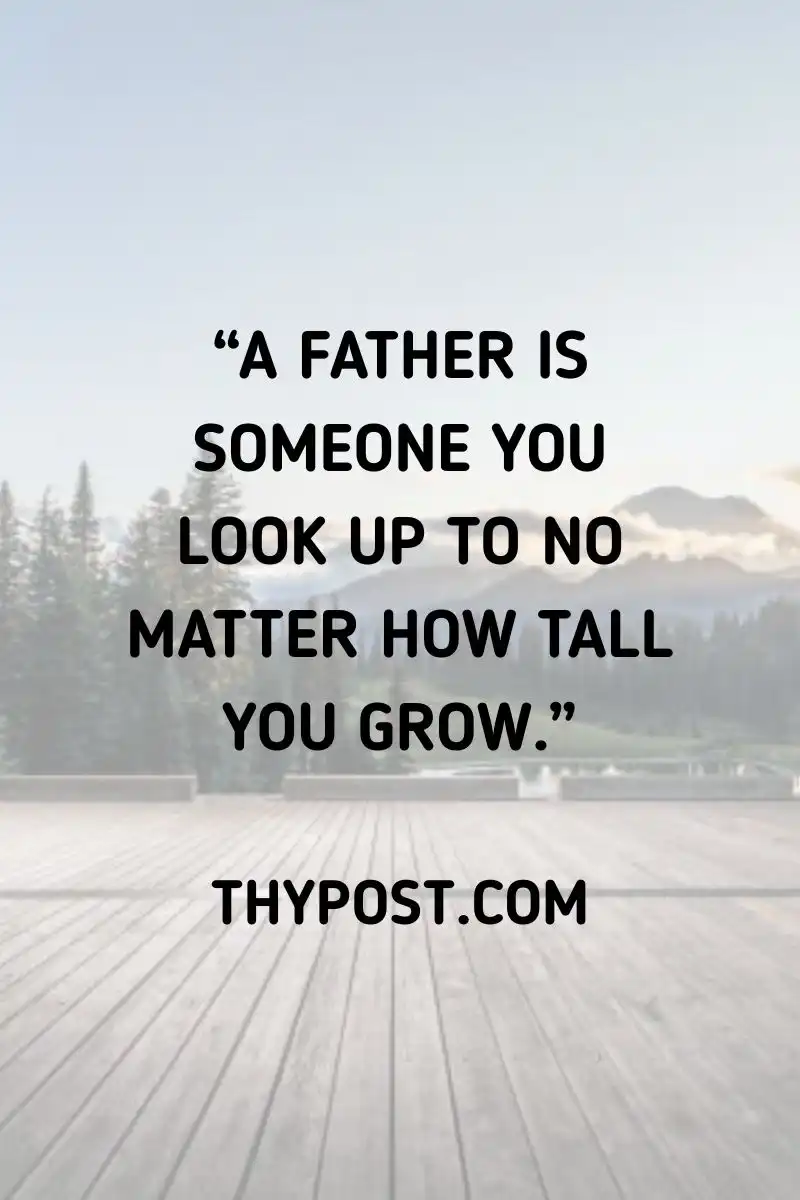 A touching Happy Father’s Day image of a child looking up to their dad with admiration.