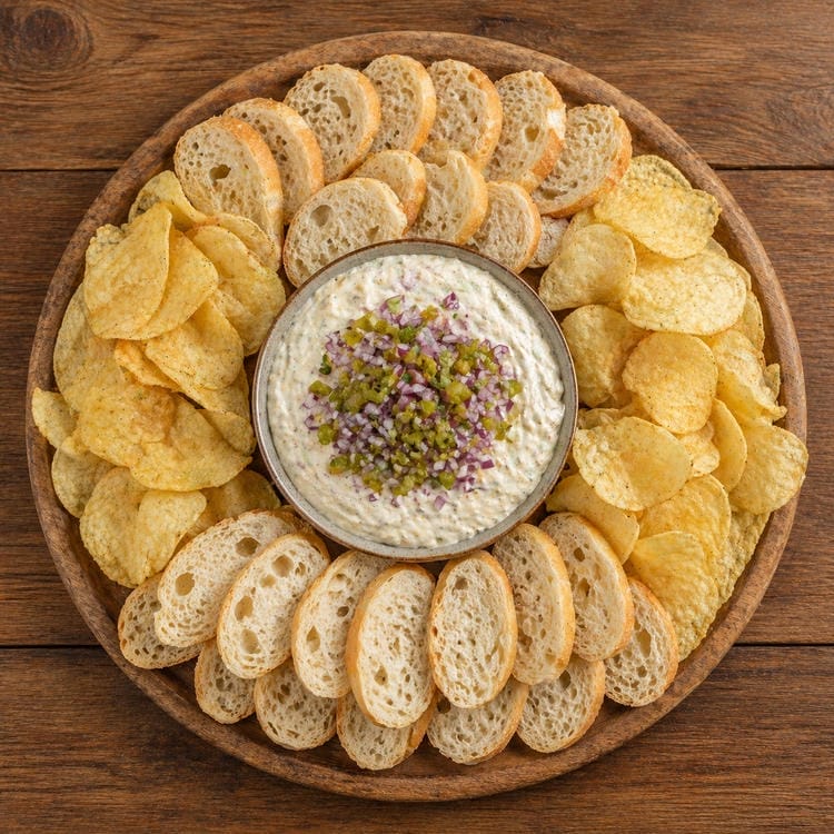 Creamy pepperoncini dip served with crackers.