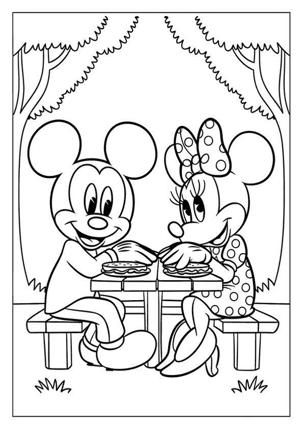 Minnie and Mickey Mouse eating pies at a picnic table.